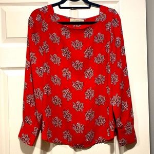 Red floral blouse